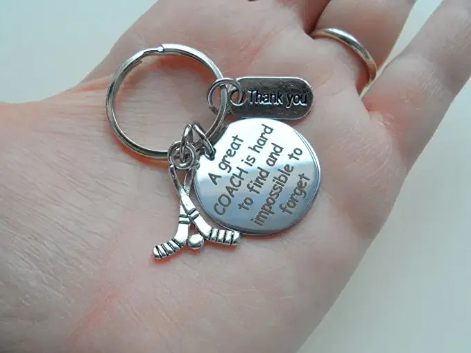 Coach Appreciation Keychain with "A Great Coach is Hard to Find and Impossible to Forget" Disc Charm (With Hockey Sticks Charm)