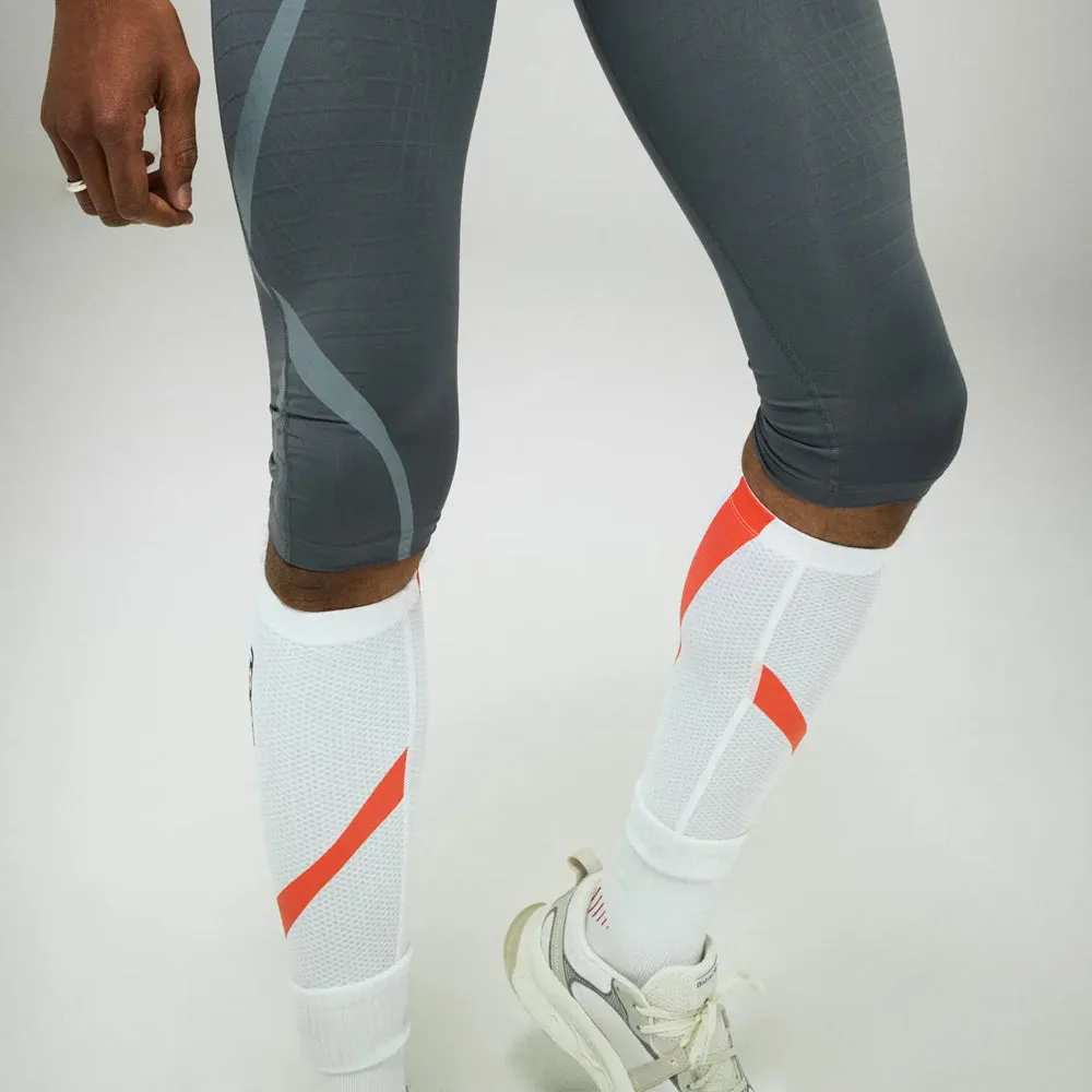 District Vision   2XU Lightweight Desert Comp Calf Guard - White/Heat Visions