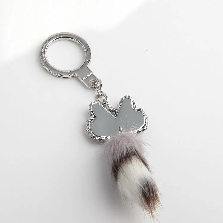 Out West Pave Raccoon Keychain